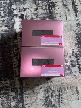 Set of 2 new small pink mailboxes